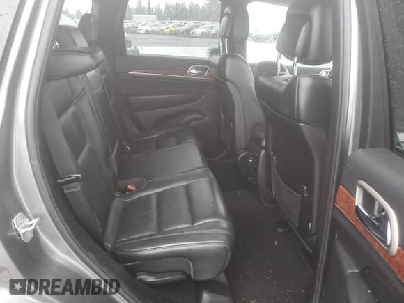 2012 Jeep Grand Cherokee Limited z VIN 1C4RJFBG2CC187150, wystawiony jako Copart lot #84956805 z przebiegiem 136 040 mil mil oraz Szkoda całkowita • Salvage title. Historia ofert i sprzedaży dostępna na DreamBid. Obrazek 10.