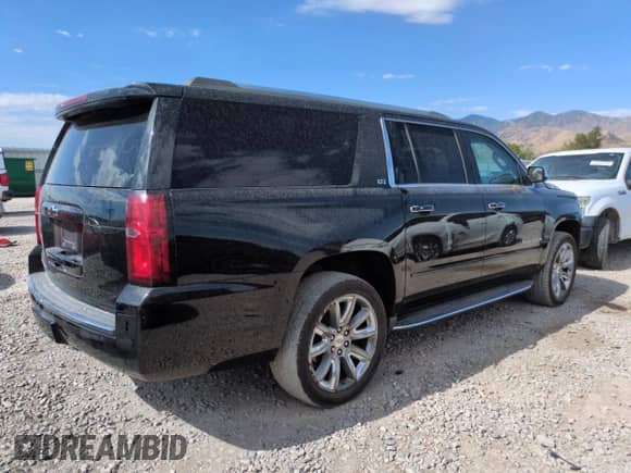 2016 Chevrolet Suburban LTZ с VIN 1GNSKJKC3GR325867, выставлен на аукционе Copart как лот 65561035 с пробегом 112 512 миль миль и Списание • Salvage title. История ставок и продаж доступна на DreamBid. Изображение 3.