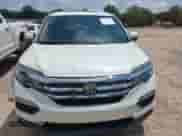 2016 Honda Pilot EX-L with VIN 5FNYF6H64GB038436, listed as a IAAI auction lot 42735200 with 165,507 mi miles and . Bid and sale history available at DreamBid. Image 12.