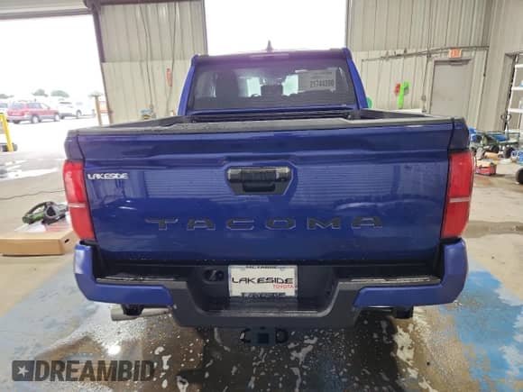 2025 Toyota Tacoma SR5 with VIN 3TMKB5FN4SM042285, listed as a Copart auction lot 70826095 with 252 mi miles and Salvage title. Bid and sale history available at DreamBid. Image 6.