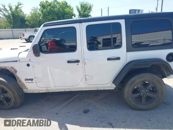 2021 Jeep Wrangler Unlimited Willys with VIN 1C4HJXDNXMW818529, listed as a IAAI auction lot 42830398 with 93,836 mi miles and . Bid and sale history available at DreamBid. Image 14.