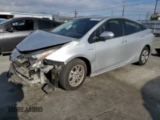 2016 Toyota Prius Two Eco z VIN JTDKARFU5G3017678, wystawiony jako Copart lot #87315355 z przebiegiem 113 805 mil mil oraz Czysty tytuł • Clean title. Historia ofert i sprzedaży dostępna na DreamBid. Obrazek 1.