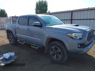 2019 Toyota Tacoma SR z VIN 3TMCZ5ANXKM227867, wystawiony jako IAAI lot #43211013 z przebiegiem 66 171 mil mil oraz . Historia ofert i sprzedaży dostępna na DreamBid. Obrazek 1.