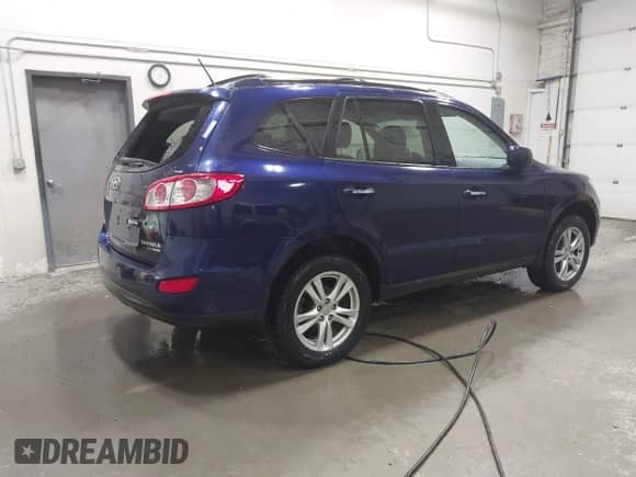 2010 Hyundai Santa Fe Limited z VIN 5NMSKDAG7AH376850, wystawiony jako IAAI lot #42229023 z przebiegiem 105 050 mil mil oraz . Historia ofert i sprzedaży dostępna na DreamBid. Obrazek 4.