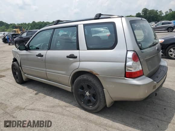 2006 Subaru Forester X with VIN JF1SG63666H758495, listed as a Copart auction lot 59368304 with 188,582 mi miles and Salvage title. Bid and sale history available at DreamBid. Image 2.