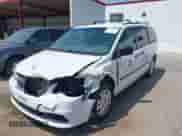 2014 Dodge Grand Caravan SE with VIN 2C4RDGBG3ER462595, listed as a IAAI auction lot 42401569 with 154,408 mi miles and . Bid and sale history available at DreamBid. Image 12.