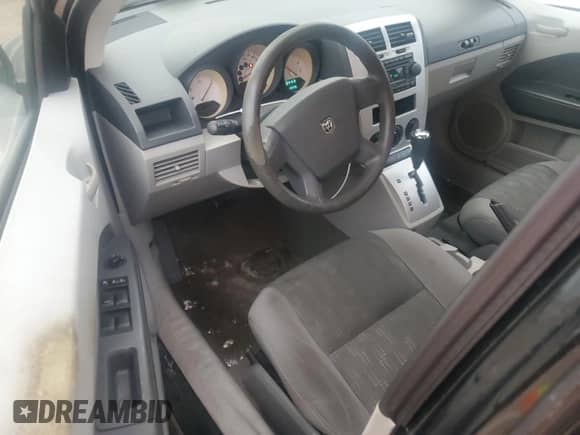 2007 Dodge Caliber с VIN 1B3HB28BX7D139054, выставлен на аукционе Copart как лот 76559914 с пробегом 119 975 миль миль и Списание • Salvage title. История ставок и продаж доступна на DreamBid. Изображение 8.