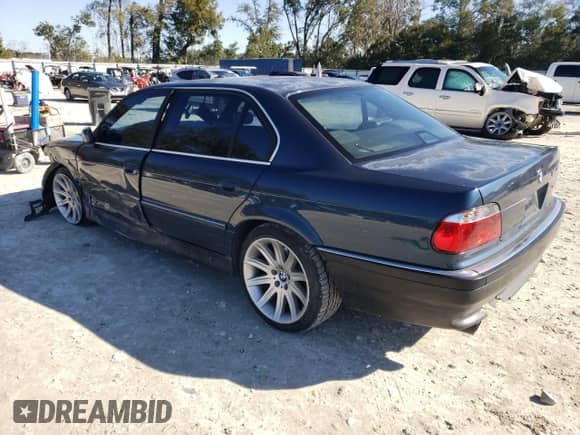 1997 BMW 7 Series 740iL with VIN WBAGJ8327VDL42579, listed as a Copart auction lot 42023485 with 143,882 mi miles and Salvage title. Bid and sale history available at DreamBid. Image 2.