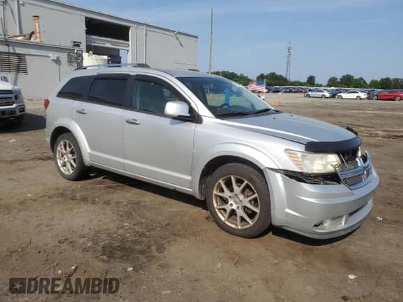 2011 Dodge Journey Crew with VIN 3D4PH3FG3BT505343, listed as a Copart auction lot 62114915 with 171,675 mi miles and Salvage title. Bid and sale history available at DreamBid. Image 4.