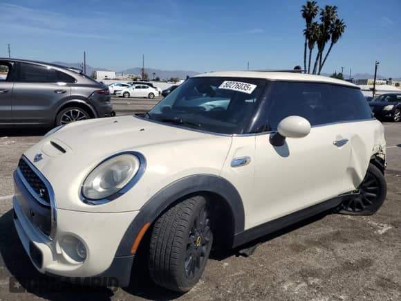 2015 MINI Hardtop S with VIN WMWXP7C52F2A36487, listed as a Copart auction lot 50276035 with 185,895 mi miles and Salvage title. Bid and sale history available at DreamBid. Image 1.