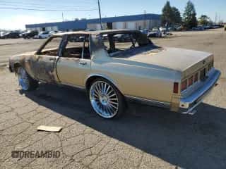1985 Chevrolet Caprice с VIN 1G1BN69H3FY124143, выставлен на аукционе Copart как лот 79644194 с пробегом Не указан миль и Чистый • Clean title. История ставок и продаж доступна на DreamBid. Изображение 2.