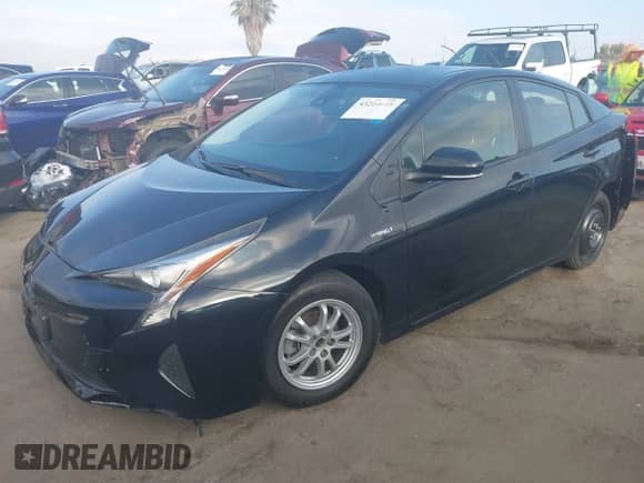 2017 Toyota Prius Two z VIN JTDKBRFU7H3029572, wystawiony jako IAAI lot #43214618 z przebiegiem 110 922 mil mil oraz . Historia ofert i sprzedaży dostępna na DreamBid. Obrazek 2.