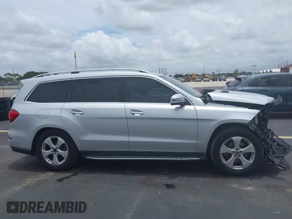 2019 Mercedes-Benz GLS 450 with VIN 4JGDF6EE1KB222797, listed as a IAAI auction lot 42772189 with 65,783 mi miles and . Bid and sale history available at DreamBid. Image 14.