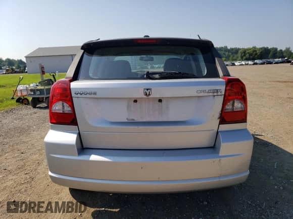 2011 Dodge Caliber z VIN 1B3CB1HA3BD296851, wystawiony jako Copart lot #68704655 z przebiegiem 113 601 mil mil oraz Czysty tytuł • Clean title. Historia ofert i sprzedaży dostępna na DreamBid. Obrazek 6.