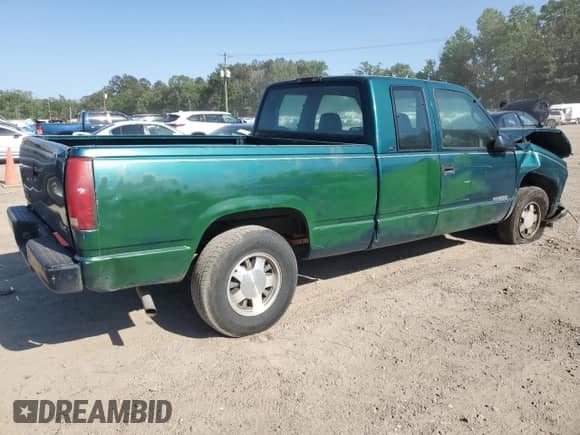1998 GMC Sierra 1500 z VIN 1GTEC19W4WE521888, wystawiony jako Copart lot #53161505 z przebiegiem 985 004 mil mil oraz Szkoda całkowita • Salvage title. Historia ofert i sprzedaży dostępna na DreamBid. Obrazek 3.