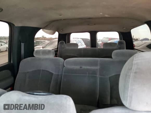 2001 Chevrolet Suburban LT z VIN 1GNEC16T91J244298, wystawiony jako Copart lot #68127834 z przebiegiem Nie podano mil oraz Szkoda całkowita • Salvage title. Historia ofert i sprzedaży dostępna na DreamBid. Obrazek 10.