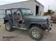 1998 Jeep Wrangler SE z VIN 1J4FY29P1WP763752, wystawiony jako Copart lot #70510885 z przebiegiem 228 480 mil mil oraz Szkoda całkowita • Salvage title. Historia ofert i sprzedaży dostępna na DreamBid. Obrazek 4.