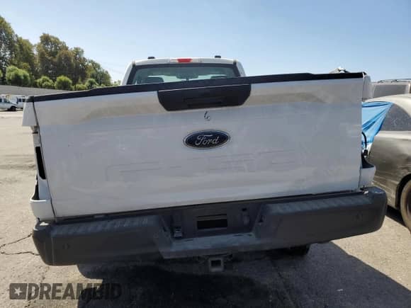 2023 Ford F-150 XL с VIN 1FTMF1CB6PKF08524, выставлен на аукционе Copart как лот 90696005 с пробегом 40 206 миль миль и Списание • Salvage title. История ставок и продаж доступна на DreamBid. Изображение 6.