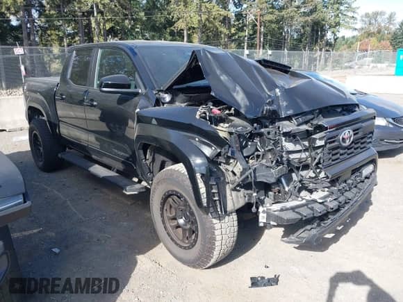 2024 Toyota Tacoma SR5 with VIN 3TMLB5JN4RM080833, listed as a IAAI auction lot 43404104 with 19,266 mi miles and . Bid and sale history available at DreamBid. Image 1.