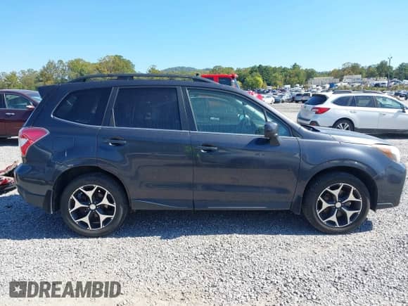 2014 Subaru Forester XT Premium with VIN JF2SJGDC2EH434742, listed as a IAAI auction lot 43425567 with 171,973 mi miles and . Bid and sale history available at DreamBid. Image 13.