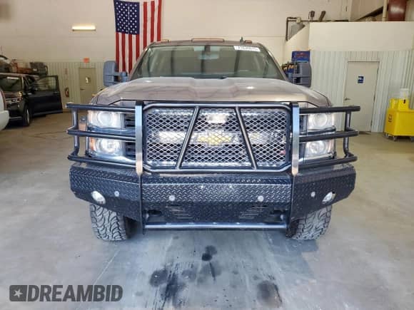 2015 Chevrolet Silverado 2500HD LT z VIN 1GC1KVEG0FF115561, wystawiony jako Copart lot #71635615 z przebiegiem Nie podano mil oraz Szkoda całkowita • Salvage title. Historia ofert i sprzedaży dostępna na DreamBid. Obrazek 5.