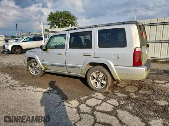 2006 Jeep Commander with VIN 1J8HH48N36C283495, listed as a Copart auction lot 70921505 with 212,349 mi miles and Clean title. Bid and sale history available at DreamBid. Image 2.
