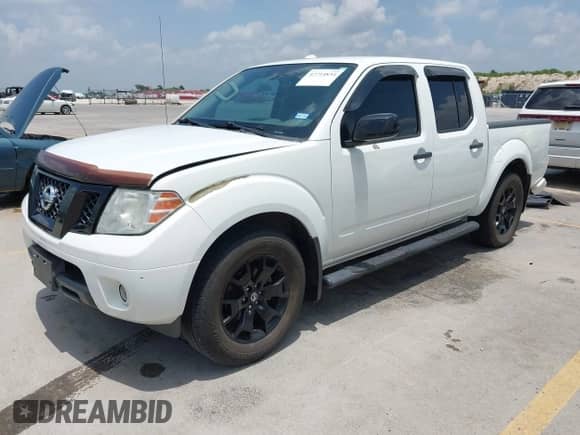 2018 Nissan Frontier SV with VIN 1N6AD0ER2JN731708, listed as a IAAI auction lot 42714834 with 77,676 mi miles and . Bid and sale history available at DreamBid. Image 2.