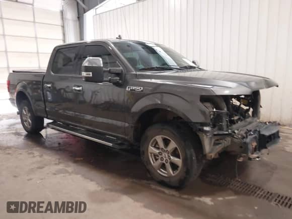 2018 Ford F-150 XL z VIN 1FTFW1EG4JKE23691, wystawiony jako IAAI lot #43305217 z przebiegiem 158 956 mil mil oraz . Historia ofert i sprzedaży dostępna na DreamBid. Obrazek 1.