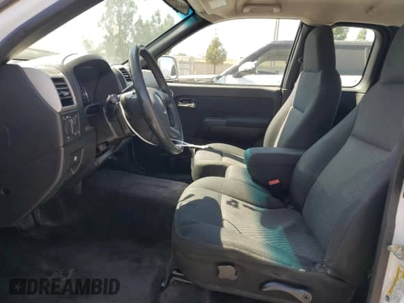 2009 Chevrolet Colorado Work Truck z VIN 1GCCS19E698155811, wystawiony jako Copart lot #71654205 z przebiegiem 214 756 mil mil oraz Szkoda całkowita • Salvage title. Historia ofert i sprzedaży dostępna na DreamBid. Obrazek 7.