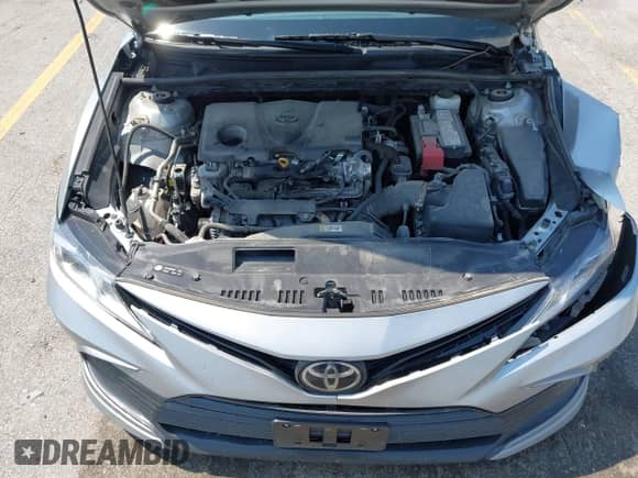 2022 Toyota Camry LE with VIN 4T1C11AK2NU052242, listed as a IAAI auction lot 42943151 with 213,562 mi miles and . Bid and sale history available at DreamBid. Image 10.