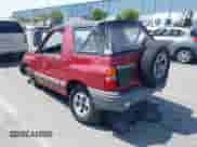 1999 Chevrolet Tracker z VIN 2CNBJ1865X6935435, wystawiony jako IAAI lot #42421108 z przebiegiem Nie podano mil oraz . Historia ofert i sprzedaży dostępna na DreamBid. Obrazek 3.
