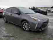 2019 Toyota Prius LE с VIN JTDL9RFU4K3011215, выставлен на аукционе Copart как лот 82524815 с пробегом 130 204 миль миль и Списание • Salvage title. История ставок и продаж доступна на DreamBid. Изображение 4.