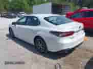 2021 Toyota Camry Hybrid XLE with VIN 4T1F31AKXMU556673, listed as a IAAI auction lot 42018439 with 56,429 mi miles and . Bid and sale history available at DreamBid. Image 3.