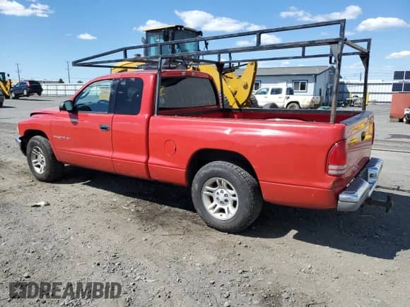 2001 Dodge Dakota Sport с VIN 1B7GL22N71S106560, выставлен на аукционе Copart как лот 55900725 с пробегом 191 801 миль миль и Списание • Salvage title. История ставок и продаж доступна на DreamBid. Изображение 2.