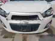 2014 Chevrolet Sonic LTZ with VIN 1G1JE5SB2E4212067, listed as a IAAI auction lot 43471089 with 97,581 mi miles and . Bid and sale history available at DreamBid. Image 6.