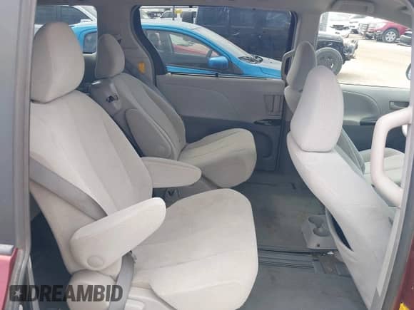 2014 Toyota Sienna LE AAS with VIN 5TDKK3DC2ES491717, listed as a IAAI auction lot 43056857 with 214,762 mi miles and . Bid and sale history available at DreamBid. Image 8.