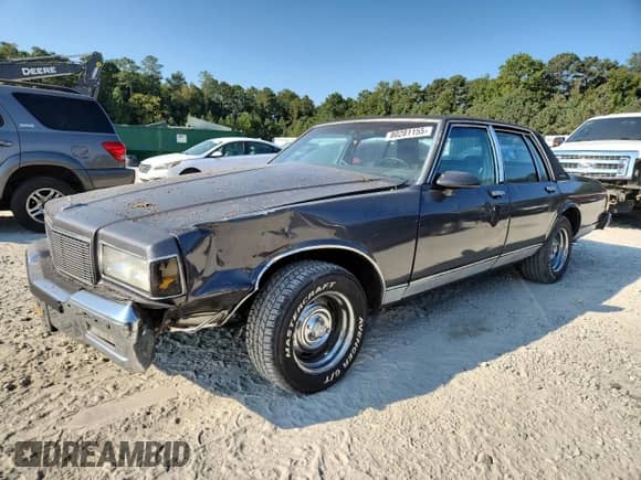 1985 Chevrolet Caprice с VIN 1G1BN69H6FY135833, выставлен на аукционе Copart как лот 80281155 с пробегом 2 381 миль миль и Списание • Salvage title. История ставок и продаж доступна на DreamBid. Изображение 1.
