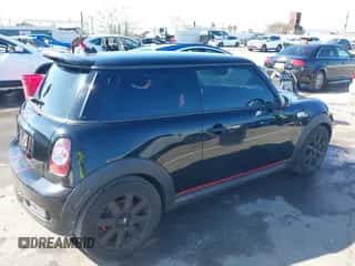 2013 MINI Hardtop S with VIN WMWSV3C56DT394382, listed as a IAAI auction lot 41744993 with 77,330 mi miles and . Bid and sale history available at DreamBid. Image 4.
