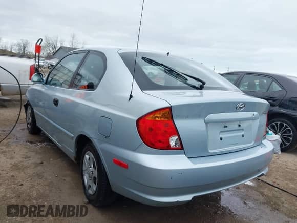 2003 Hyundai Accent GL с VIN KMHCG35C23U264360, выставлен на аукционе IAAI как лот 42033316 с пробегом 100 991 миль миль и . История ставок и продаж доступна на DreamBid. Изображение 3.