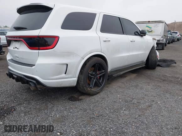 2021 Dodge Durango SRT 392 with VIN 1C4SDJGJ4MC696660, listed as a IAAI auction lot 42419277 with 30,521 mi miles and . Bid and sale history available at DreamBid. Image 4.