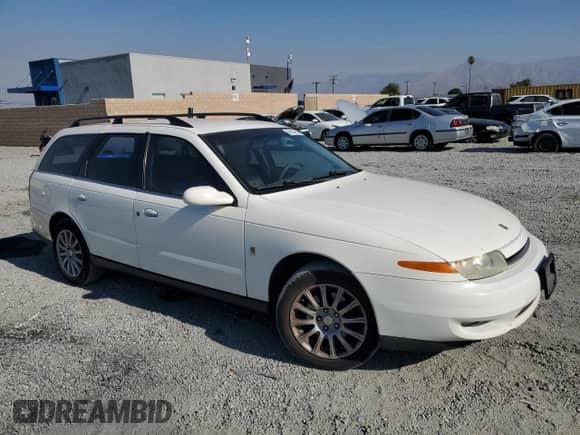 2002 Saturn LW with VIN 1G8JU84F02Y561111, listed as a Copart auction lot 66164785 with 275,328 mi miles and Salvage title. Bid and sale history available at DreamBid. Image 4.