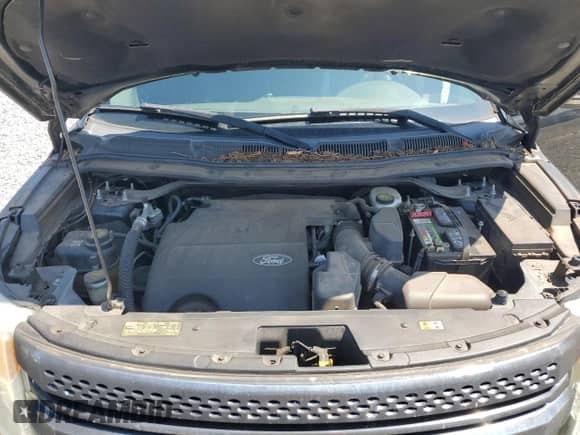 2012 Ford Explorer XLT z VIN 1FMHK7D85CGA74818, wystawiony jako Copart lot #65789095 z przebiegiem 141 627 mil mil oraz Szkoda całkowita • Salvage title. Historia ofert i sprzedaży dostępna na DreamBid. Obrazek 12.