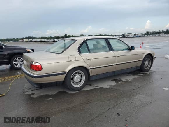 1996 BMW 7 Series with VIN WBAGK2328TDH67366, listed as a Copart auction lot 63475575 with 114,177 mi miles and Salvage title. Bid and sale history available at DreamBid. Image 3.