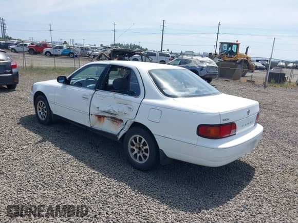 1996 Toyota Camry DX with VIN JT2BG12K7T0378581, listed as a IAAI auction lot 42454475 with 219,811 mi miles and . Bid and sale history available at DreamBid. Image 3.