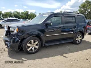 2012 Honda Pilot Touring with VIN 5FNYF4H96CB019699, listed as a Copart auction lot 70732935 with 267,196 mi miles and Salvage title. Bid and sale history available at DreamBid. Image 1.