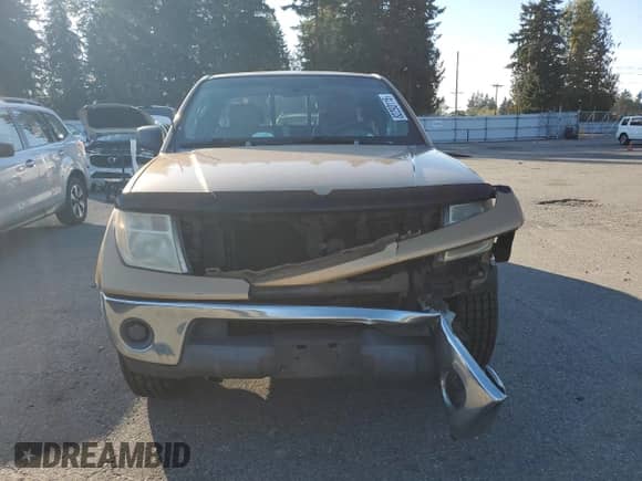 2005 Nissan Frontier SE z VIN 1N6AD06W95C403370, wystawiony jako Copart lot #82293115 z przebiegiem 263 899 mil mil oraz Szkoda całkowita • Salvage title. Historia ofert i sprzedaży dostępna na DreamBid. Obrazek 5.
