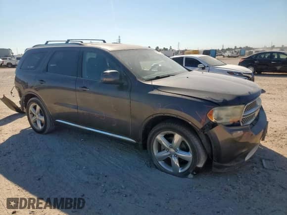 2013 Dodge Durango SXT z VIN 1C4RDHAG5DC699331, wystawiony jako Copart lot #86268795 z przebiegiem 149 360 mil mil oraz Szkoda całkowita • Salvage title. Historia ofert i sprzedaży dostępna na DreamBid. Obrazek 4.