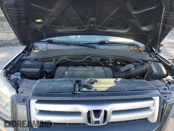 2006 Honda Pilot LX с VIN 5FNYF18166B000938, выставлен на аукционе Copart как лот 87070355 с пробегом 211 620 миль миль и Списание • Salvage title. История ставок и продаж доступна на DreamBid. Изображение 12.