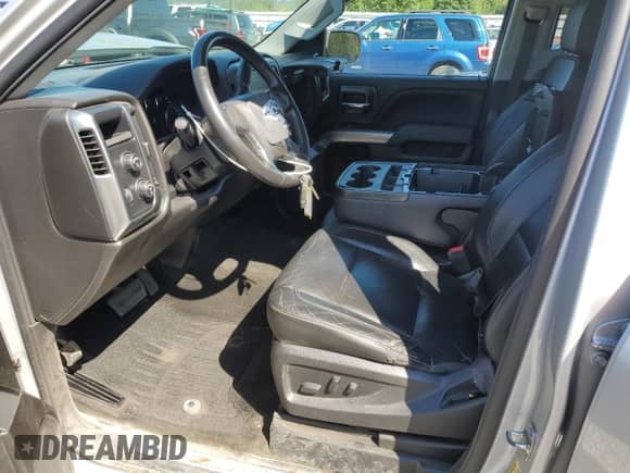 2017 Chevrolet Silverado 1500 LT with VIN 1GCVKREH2HZ352085, listed as a Copart auction lot 69423615 with 227,392 mi miles and Salvage title. Bid and sale history available at DreamBid. Image 7.