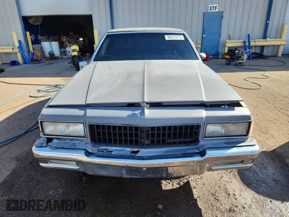 1983 Chevrolet Caprice with VIN 1G1AN69H6DX155174, listed as a Copart auction lot 80213775 with 19,781 mi miles and Salvage title. Bid and sale history available at DreamBid. Image 5.